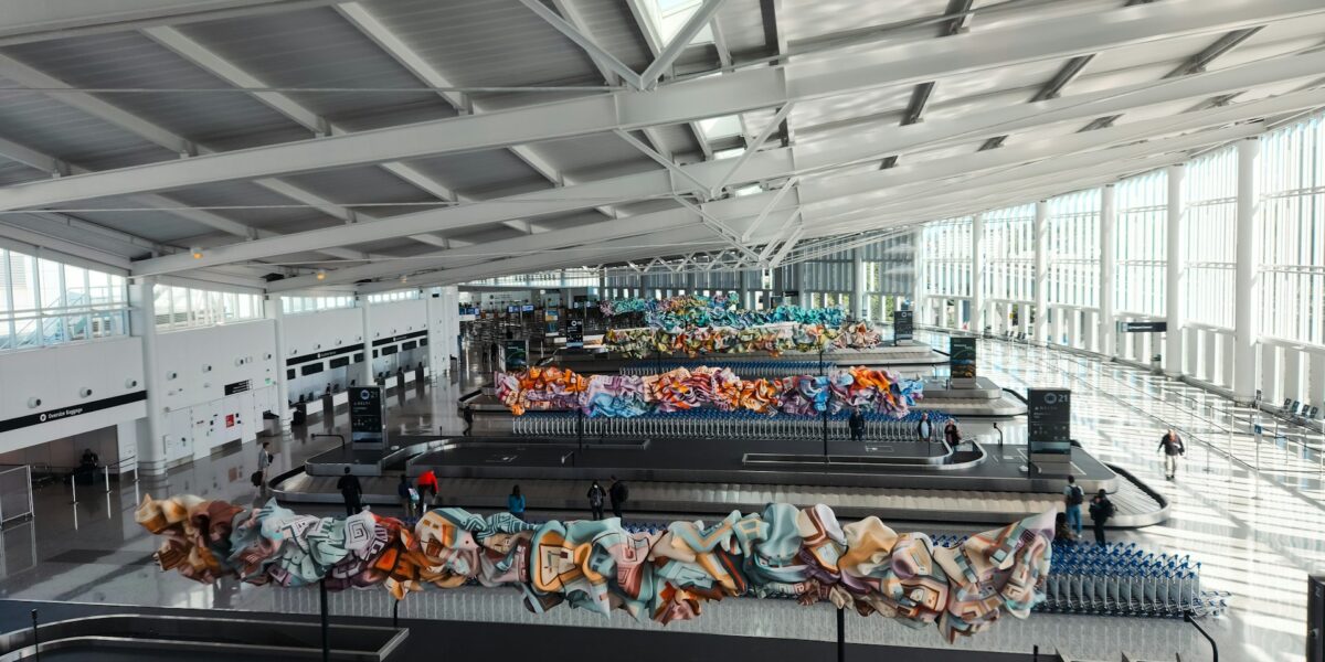 Why do airports use flight information boards